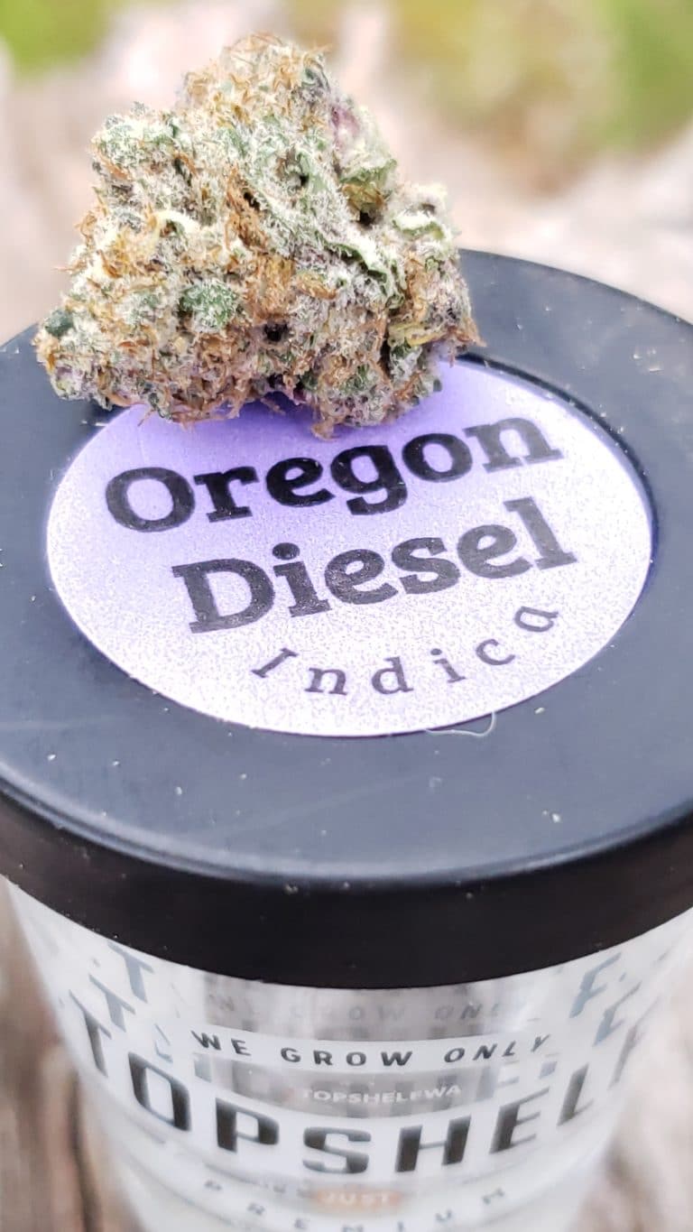 oregon diesel by top shelf cannabis on top of shot glass packaging